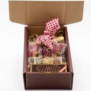 Genussbox von Konditorei Jindrak mit Linzer Törtchen, Stollen, Trüffeln und Mini-Törtchen – Geschenkbox aus Linz